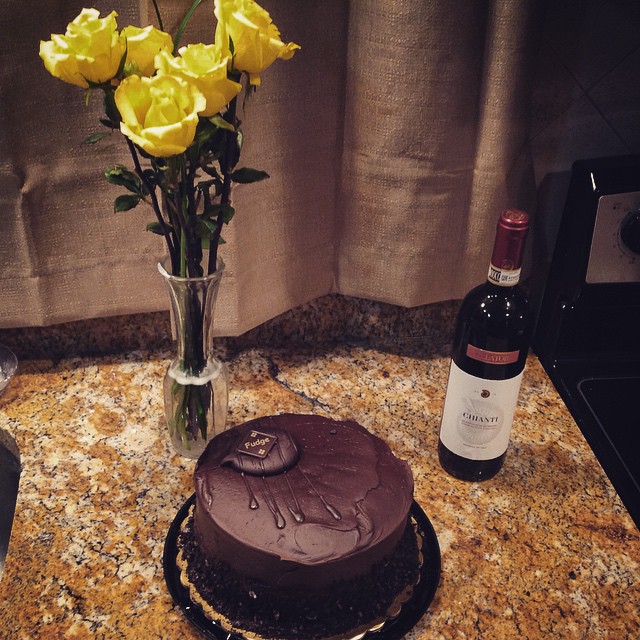 Not only does my husband do the grocery shopping for me, ((since it is my least favorite errand)) this is what he brings home.. Very blessed  #chocolate #roses #yellow #wine #cake #love #newhouse