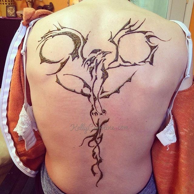 Something different for me - a request two years ago at the studio for an abstract phoenix tattoo. She loved it- which is a relief because delicate abstract work is something that I do less often than full floral designs. #henna #hennas #hennaartist #kellycaroline #michigan #phoenix #tribal #delicate #linework #tattoo #tattoos #bird #backtattoo #ypsi #ypsilanti #yogi #yogi #hennatattoo #hennamichigan
