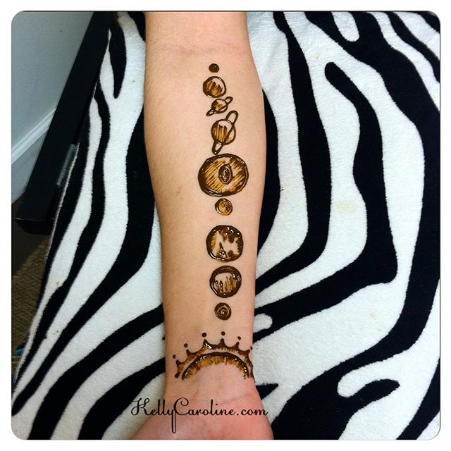 A fun henna tattoo design of the solar system. Great idea @rach.l_2019 ! . . . . private appointments available Monday-Saturday 2-5:30pm call 734-536-1705 or email kelly@kellycaroline.com #henna #hennas #hennaartist #kellycaroline #michigan #michiganartist #dearborn #dearbornheights #mehndi #mehndidesign #tattoo #tattoos #ink #organic #hennadesign #hennatattoo #hennatattoos #flower #flowers #yoga #yogi #mandala #ypsi #ypsilanti #detroit #birthday
