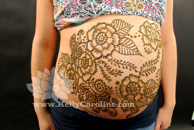 henna baby belly design, floral henna design on belly, mommy henna