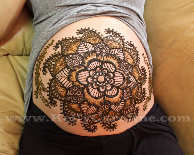 baby belly henna, henna design, flower henna