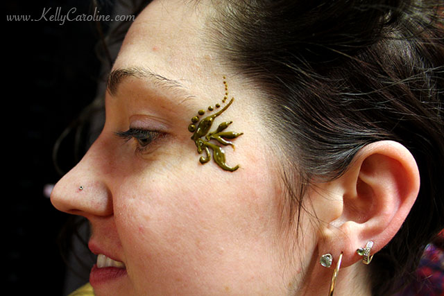 henna tattoo design on face