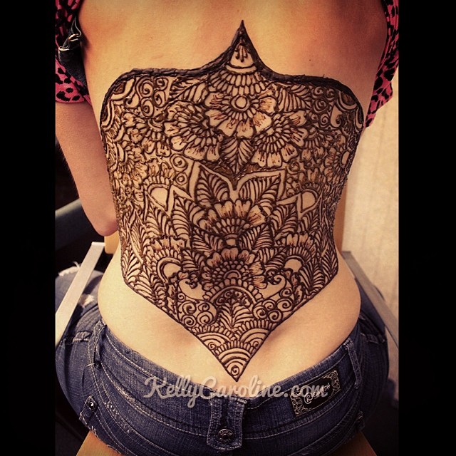 Henna corset design with flowers by Kelly Caroline henna artist http://www.kellycaroline.com #henna #corset #tattoos #tattoo #michigan #ypsilanti #mehndi #flowers #leaves #hennaartist #kellycaroline #art #artist #tattoodesigns #design #ypsi #photoshoot #drawing