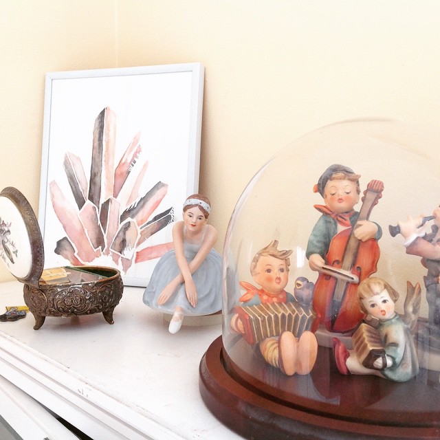 A little peek at my favorite shelf in my art room – my grandmother have me each of those Hummel figures, the musical ballerina and the jewelry box which is also a sweet little music box. I painted the crystal print in the background, inspired by a watercolor calendar I had several years ago.