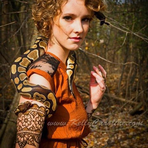 Henna cuff tattoo around the arm. One of my all time favorite photoshoots I was a part of. That snake was so fantastic!