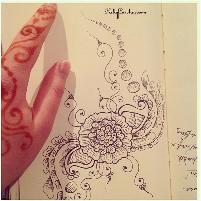 A picture with a little henna stain on my hands. A little vine action showcasing a new mandala henna design from my sketchbook last night