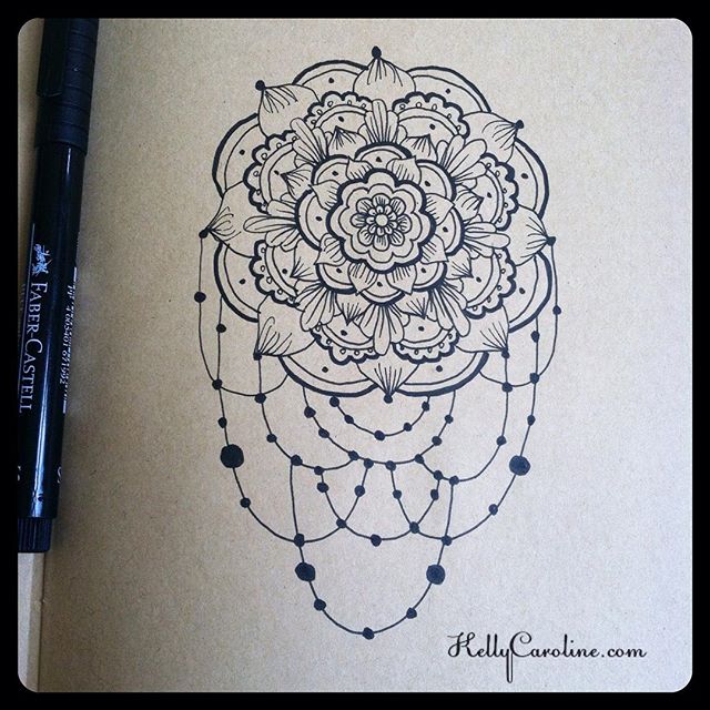 Black inked mandala with a fun jewelry beaded dangle