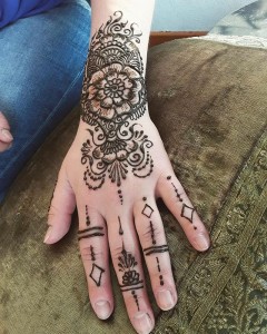 Henna on the hand with rings - henna designs for the hand and wrist, henna michigan
